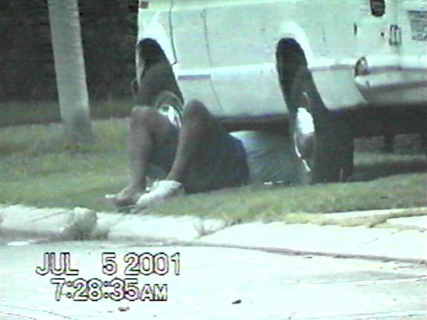 Person Working on a Vehicle